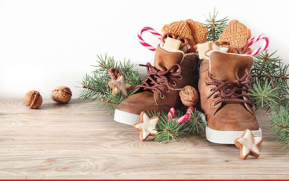 An arrangement of sweets in two small shoes.