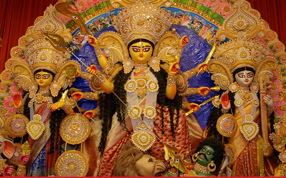 Idol of Goddess Devi Durga at a decorated puja pandal in Kolkata, West Bengal, India.