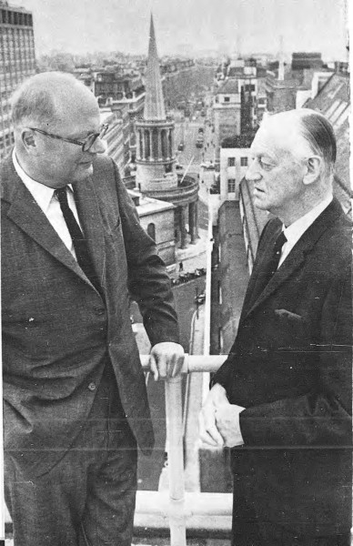 Black and white photograph of two men in suits.
