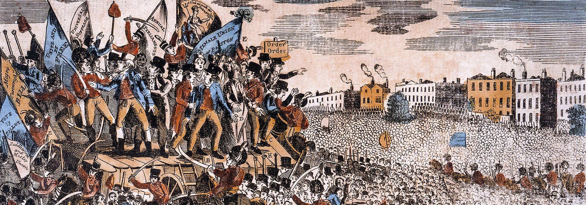 An illustration of the Peterloo Massacre (1819). A group of people stand on a platform holding banners on the left, and a large crowd of people feature on the right. Beneath the platform, officers on horseback can be seen wielding swords.