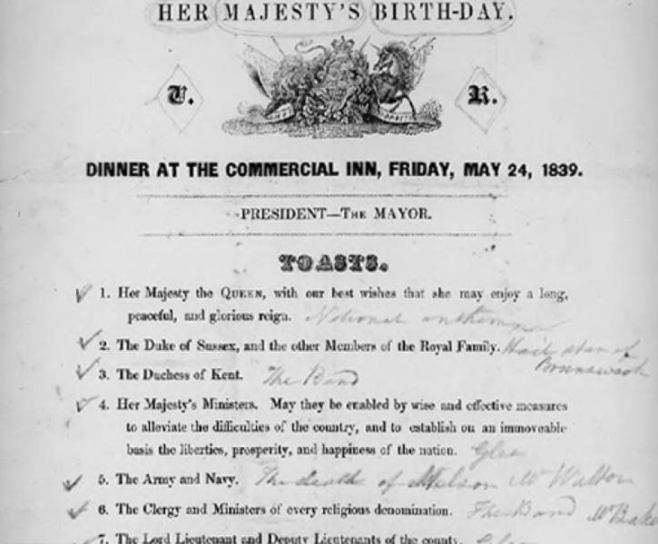 Section of a document titled Her Majesty's Birthday, followed by the coat of arms of the United Kingdom, and the subtitle Dinner at the Commercial Inn, Friday, May 24, 1839. Visible is a section of the document titled Toasts, followed by 7 numbered points.