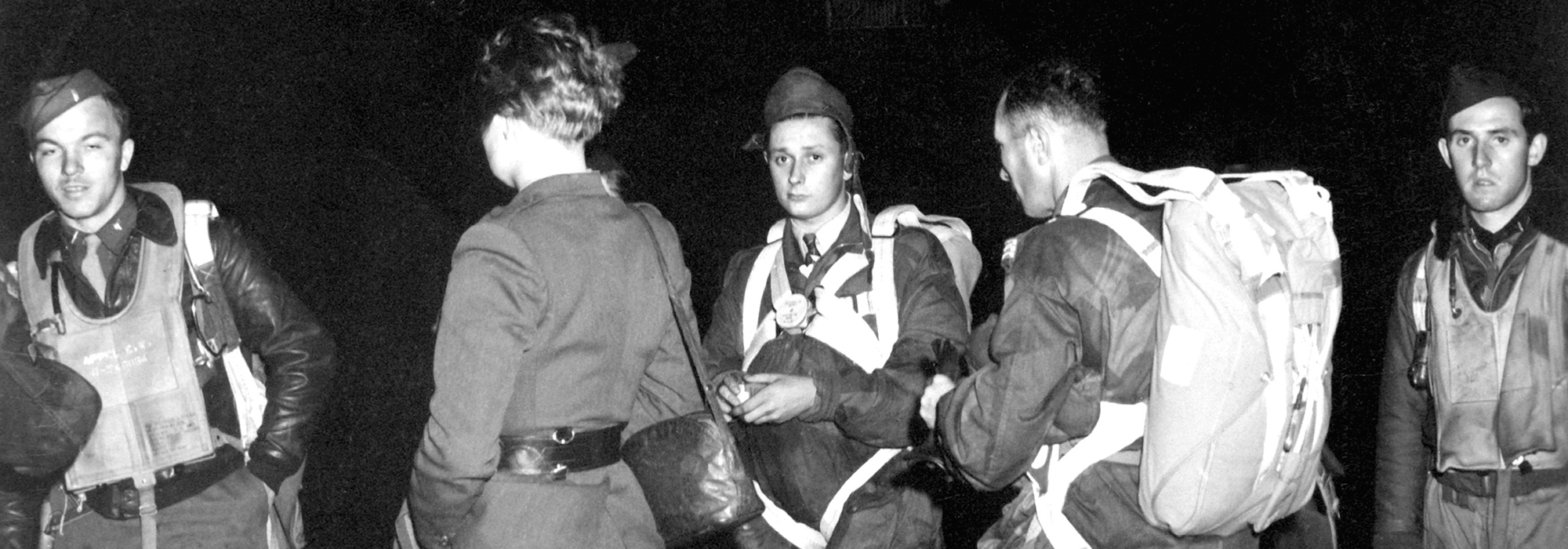 Jedburghs in front of B-24 just before night at Area T, Harrington Airdrome, England