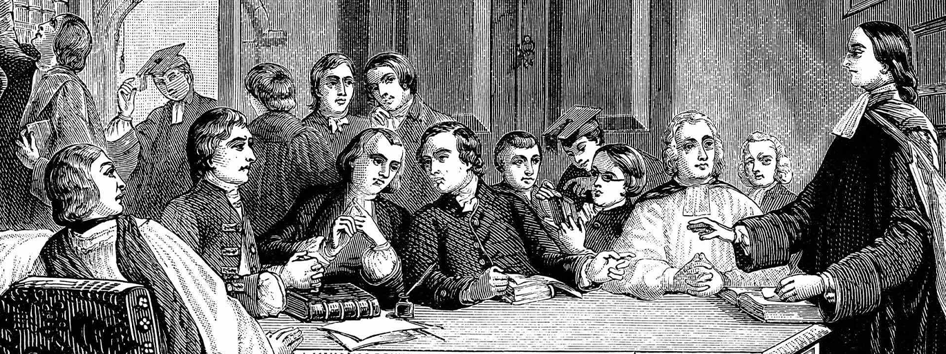 John Wesley stands at the head of the table, with a crowd of men sat around it. This illustration depicts the beginnings of the Methodist church