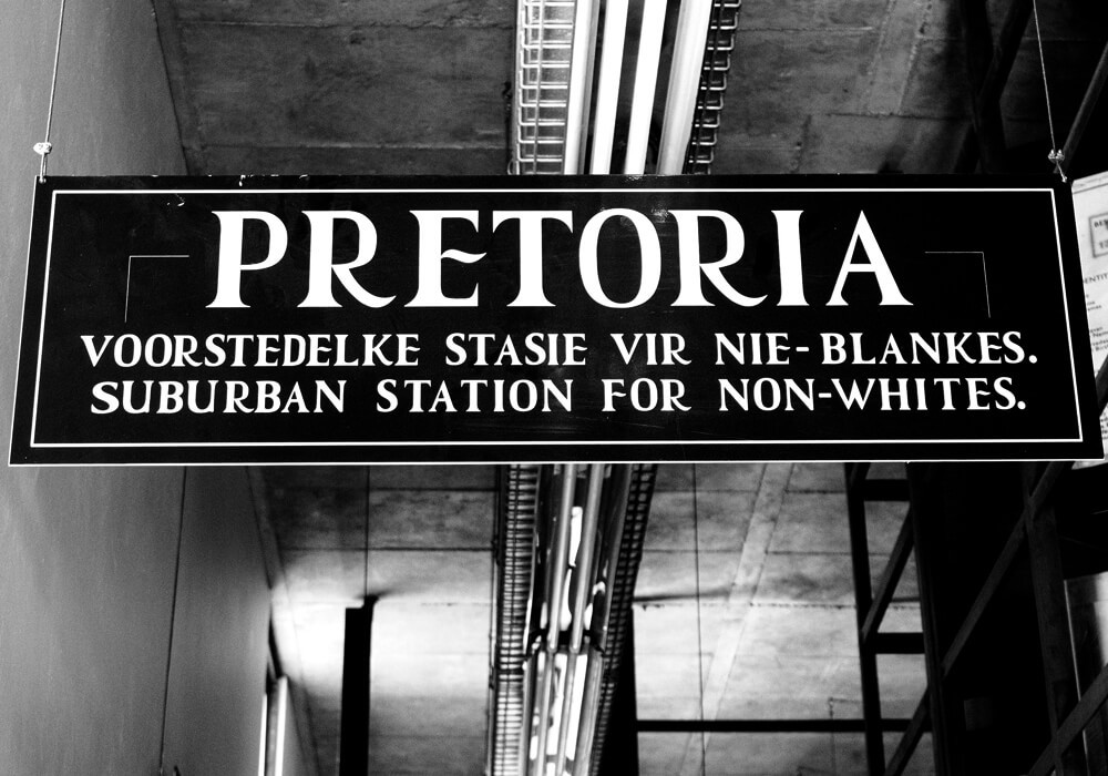 Apartheid Museum sign next to the entrance. The exhibition is dedicated to regime apartheid and the 20th century history of South Africa.
