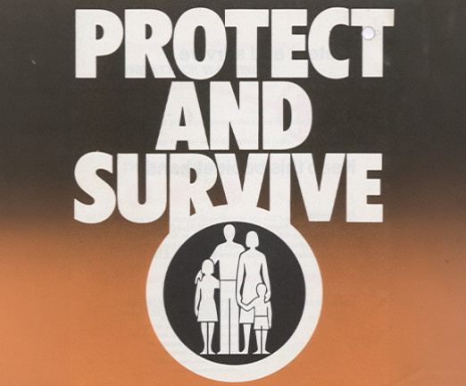 The front cover of the Protect and Survive leaflet. Beneath the title, there is a logo of a family stood inside a hollow circle.