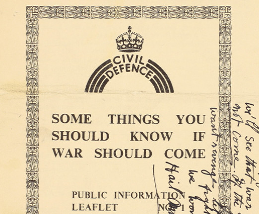 Aged paper with an ornate border and a logo resembling a rainbow arch with Civil Defence written in arched text within it, along with a crown above it. The document is titled Some Things You Should Know If War Should Come. There are handwritten annotations over the page.