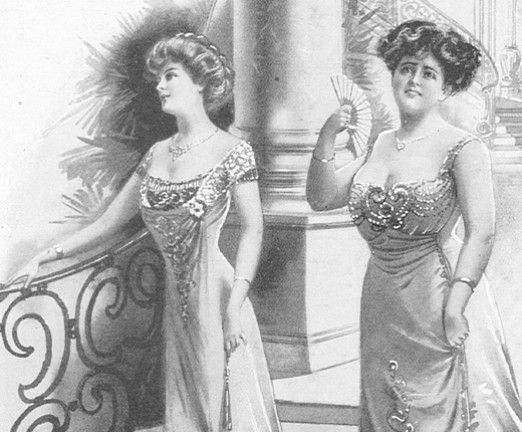 To women stand on a grand staircase in elegant dresses. One woman is of a very slim build, and the other has a fuller figure. The slim woman smiles into the distance while the other woman looks sad, and fans herself.