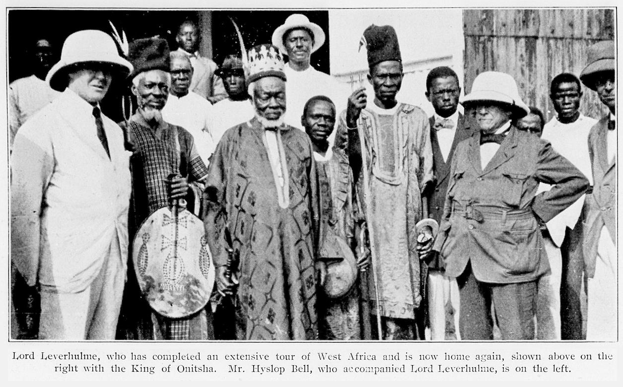 A photograph of Lord Leverhulme with the King of Onitsha and several other men, captioned Lord Leverhulme, who has completed an extensive tour of West Africa and is now home again, shown above on the right with the King of Onitsha. Mr. Hyslop Bell, who accompanies Lord Leverhulme, is on the left.