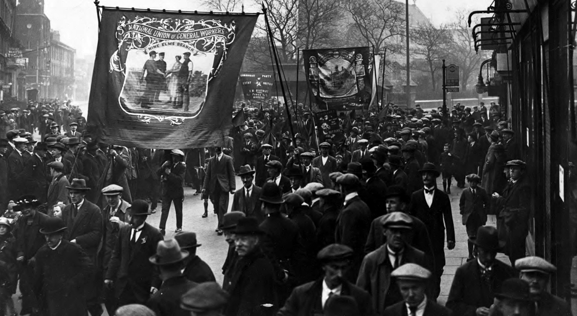 Ablack and white image of a 'General Union' rally in the UK.