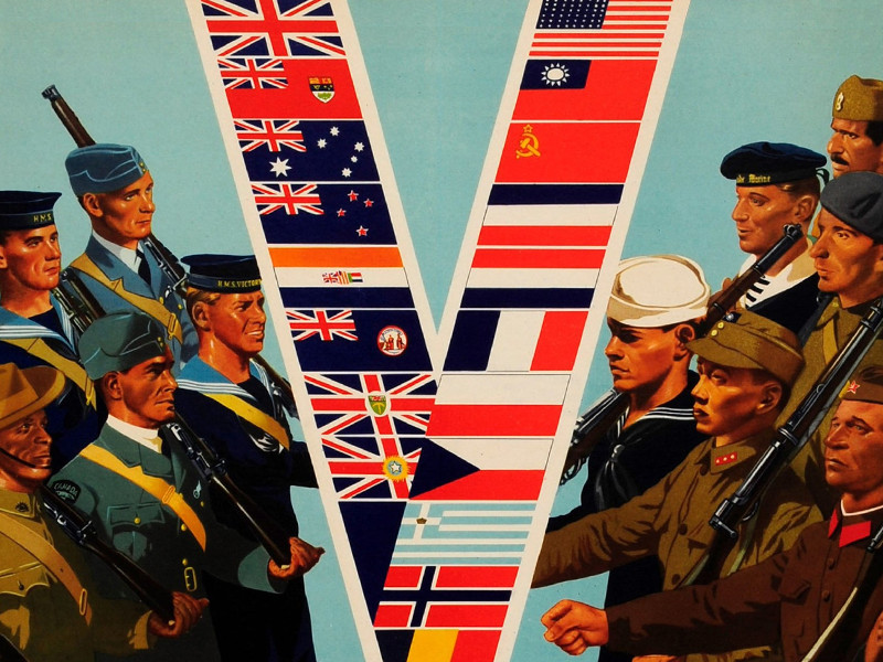 Colour poster by William Little issued in 1941 showing two groups of armed marching soldiers, one from each of the countries allied to fight Germany, Japan, and Italy, facing a giant V for victory composed of the flags of each of the countries allied in the fight.