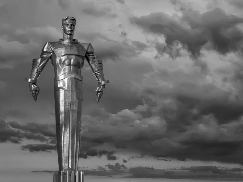 A black and white picture of the monument to Yuri Gagarin in Moscow. Yuri Gagarin was the first person to travel in space and the monument is a titanium statue on a 42.5-meter high pedestal.