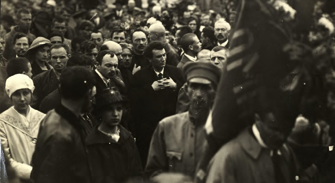 An old black and white image of a crowd of people.