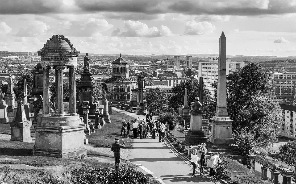 A black and white image of Glasgow's Necropolis, sited on a hill near the city centre, which is the resting place of many famous Scots.