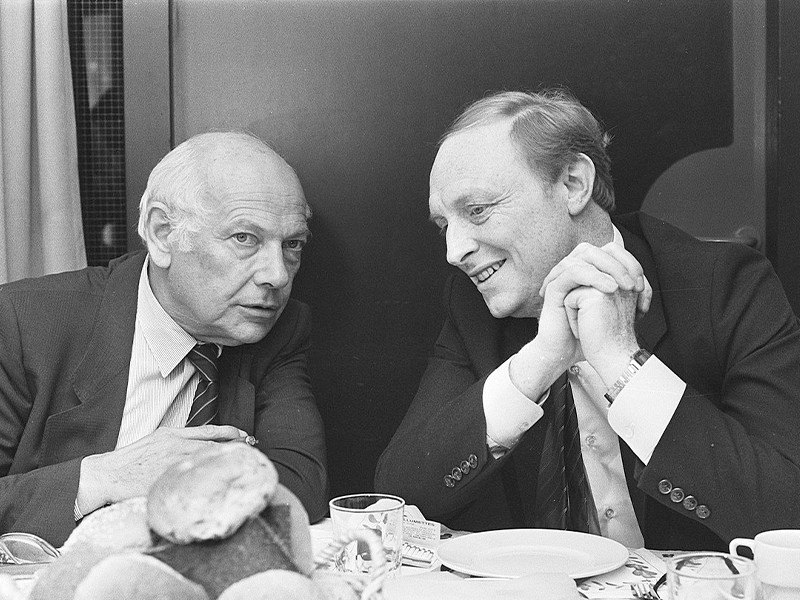 Black and white photograph of Joop den Uyl and Neil Kinnock.
