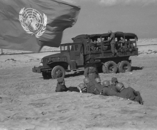 A photograph of United Nations Emergency Force soldiers resting in Sinai during the Suez Crisis.