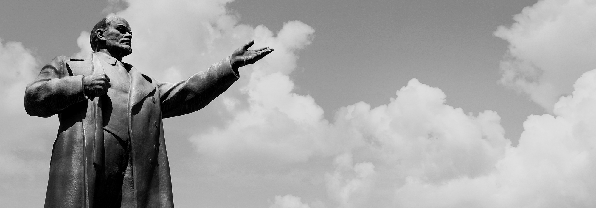 A black and white image of a Lenin statue.