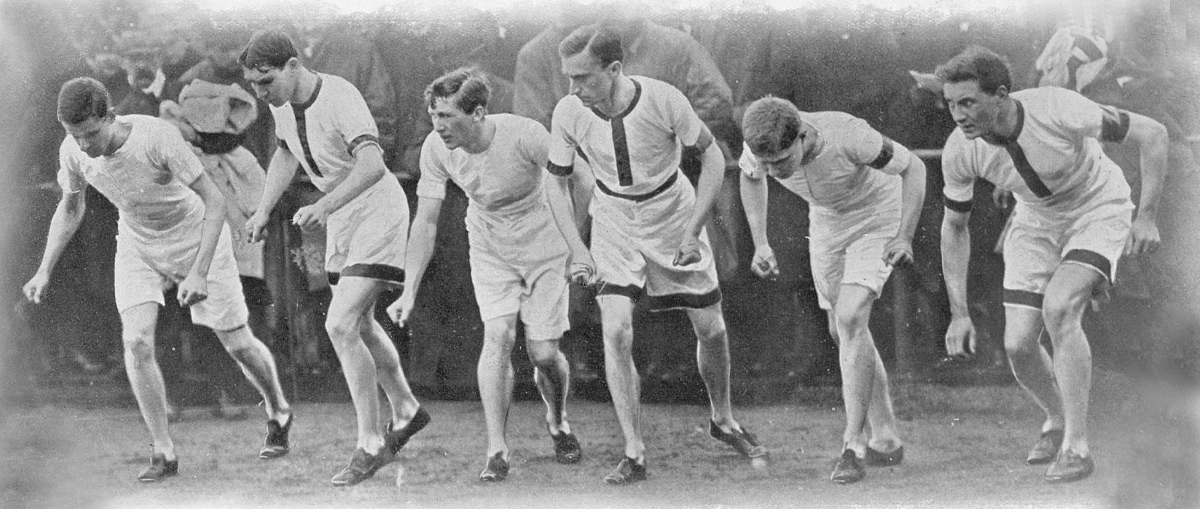 Photograph of six competitors at the starting line of a running race, 1906