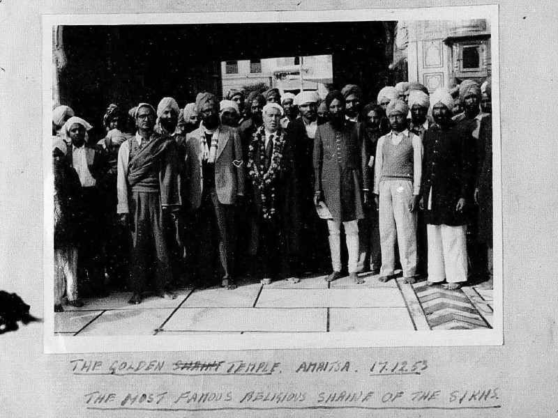 Black and white photograph of Henry Pollitt with several Sikh men, dated 17 December 1953 and captioned The Golden Temple. Amaitsa, The Most Famous Religious Shrine of the Sikhs.