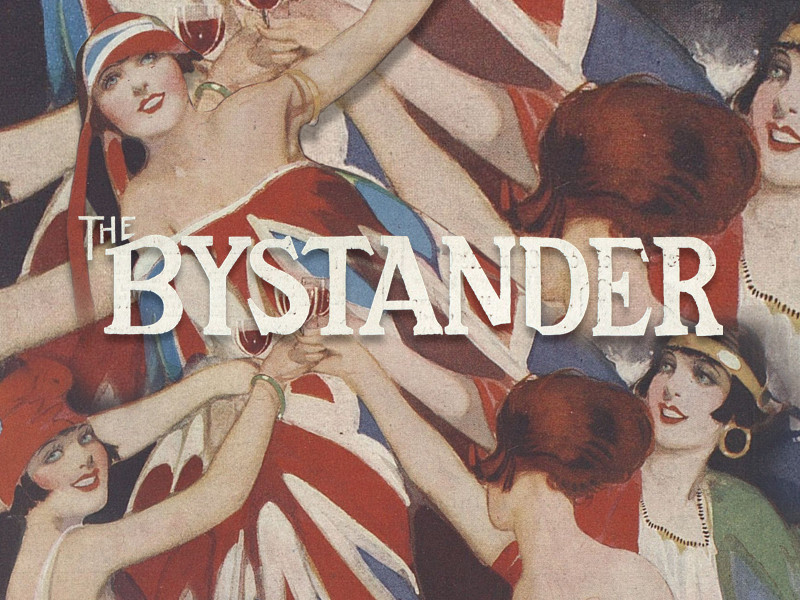 Front cover of The Bystander showing illustrations of women wearing Union Jack dresses, with The Bystander in white letters.