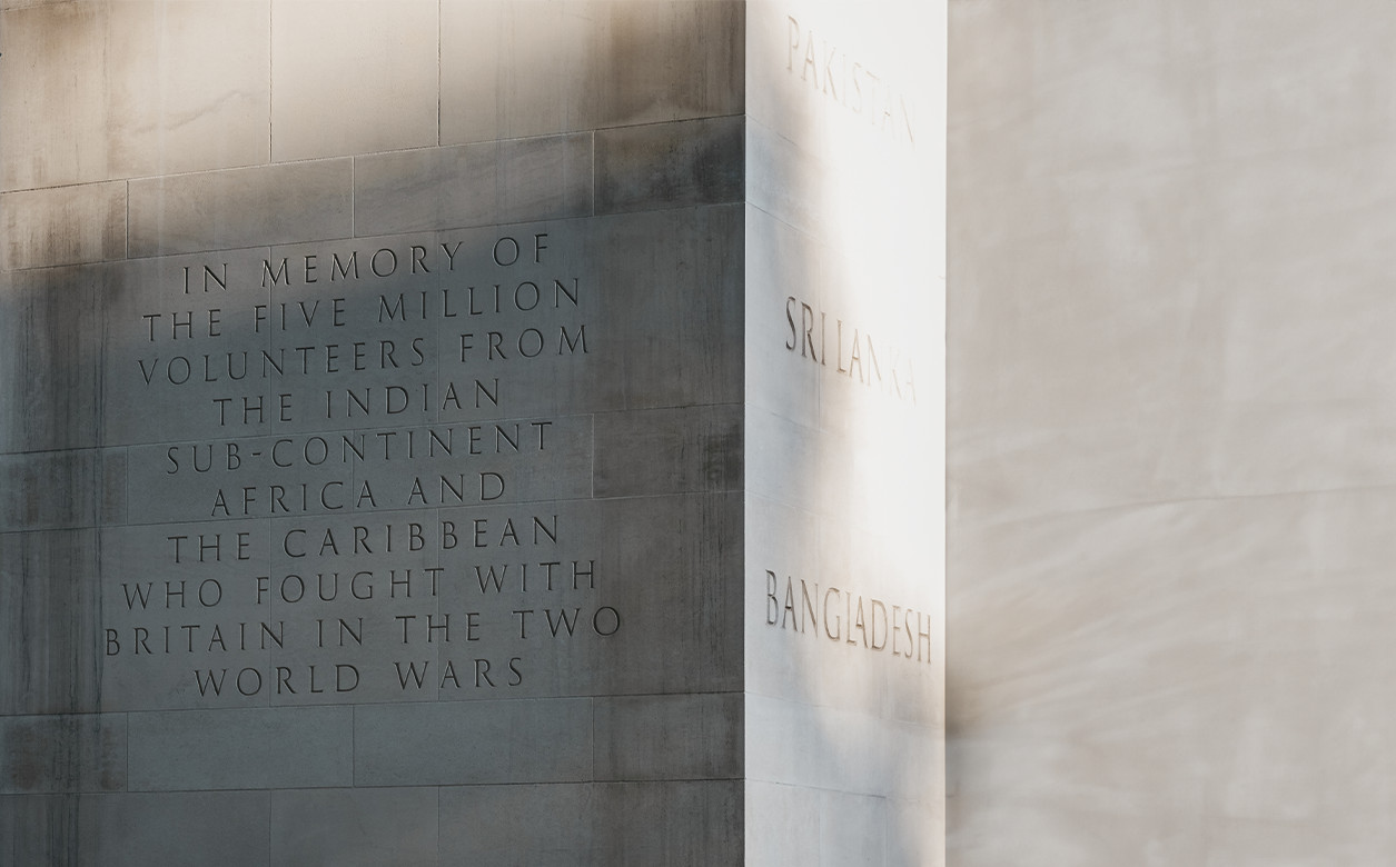 A memorial inscribed in a wall that reads: In memory of the five million volunteers from the Indian-subcontinent, Africa and the Caribbean who fought with Britain in the two World Wars.