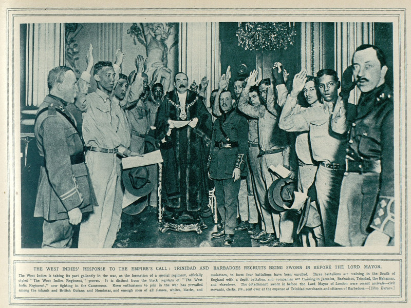 Greyscale photograph of soldiers from the British colonies in the Caribbean being sworn in, with the caption The West Indies' Response to the Empire's Call: Trinidad and Barbadoes Recruits Being Sworn in Before the Lord Mayor