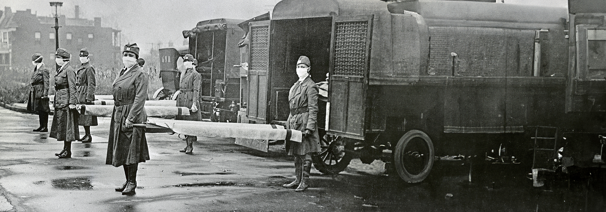 Black and white image of nurses wearing masks.