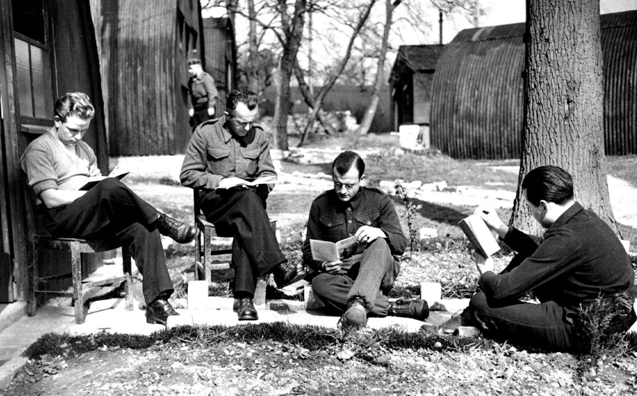 A black and white image of POWs at a re-education camp.