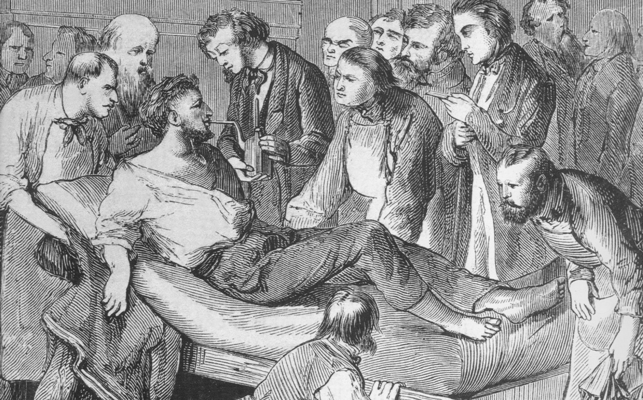 A drawing depicting a man laid on a bed surrounded by physicians, denoting the first use of surgical anesthesia.