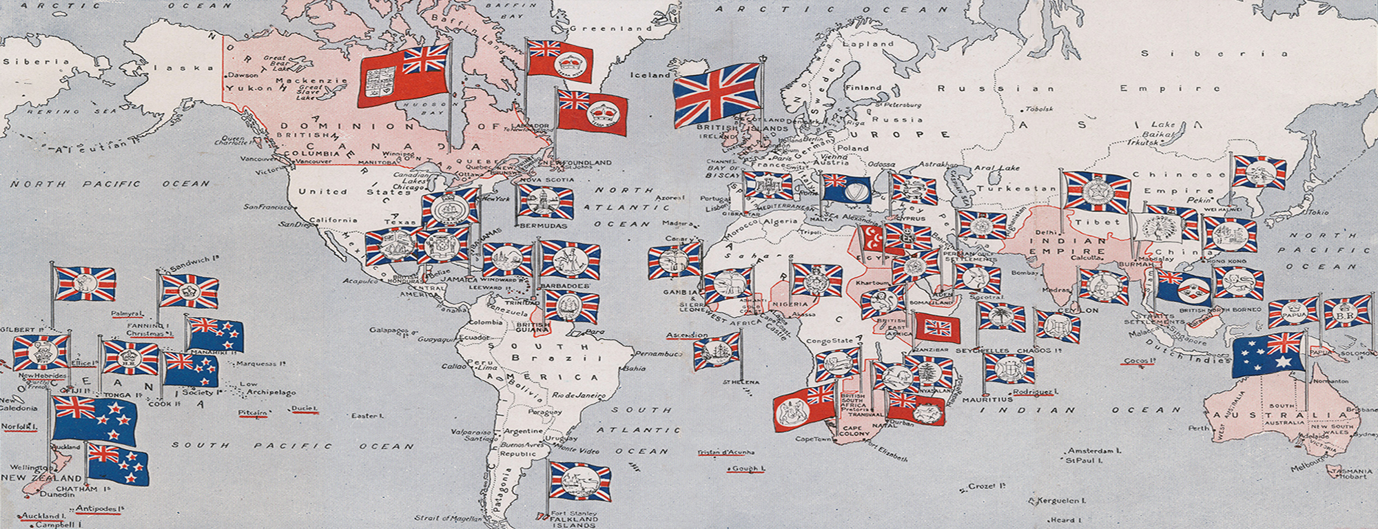1910 map titled “Flags of a Free Empire, Showing the Emblems of British Empire Throughout the World".