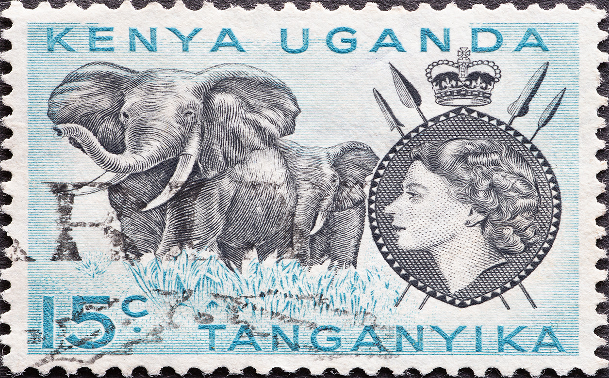 A postage stamp from British East Africa , showing a portrait of Queen Elizabeth II and African Elephant.