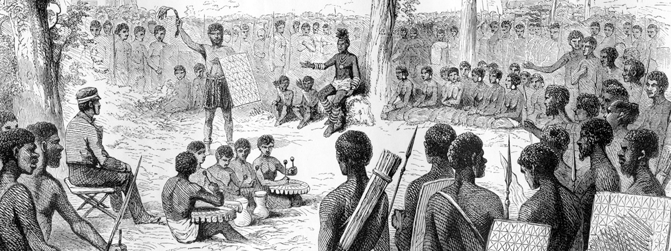 Reception of the Mission by Shinté. People are gathered around as music is played.