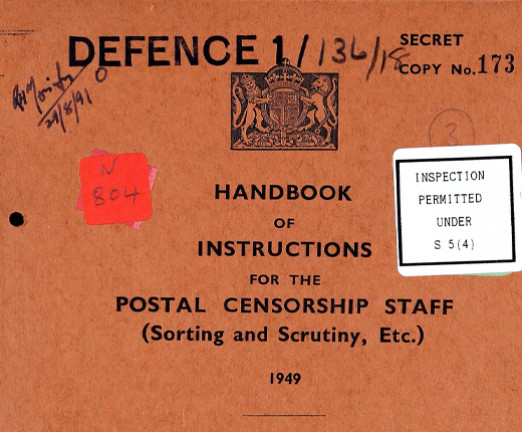 A tan coloured file cover that reads Defence 1. There is a stamped crest above the title of the file Handbook of Instructions for the Postal Censorship Staff.