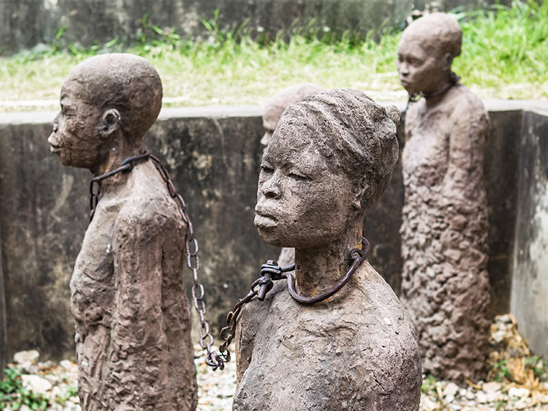 Sculpture of enslaved people dedicated to victims of slavery in Stone Town, Zanzibar, Tanzania.