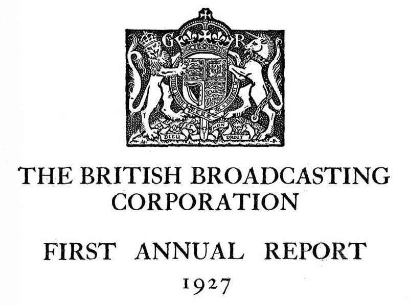 A cover page with a shield surrounded by a lion and a unicorn, with text in serif font that reads: The British Broadcasting Corporation First Annual Report 1927.