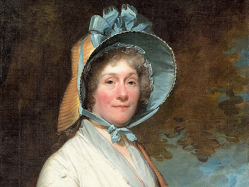 An oil on canvas portrait of Henrietta Marchant Liston. She wears a pale dress and a large bonnet tied with blue ribbon.