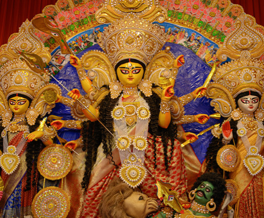 Idol of Goddess Devi Durga at a decorated puja pandal in Kolkata, West Bengal, India.