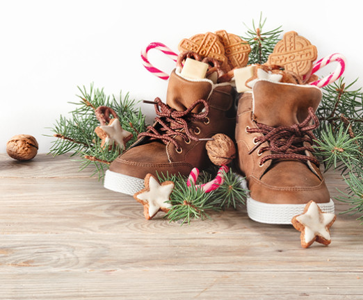 An arrangement of sweets in two small shoes.